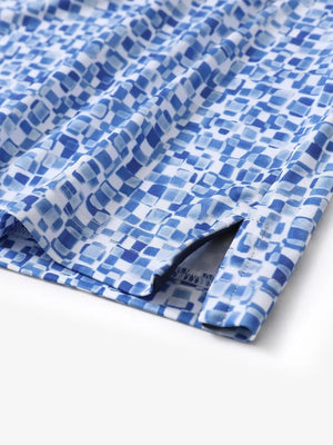 Hem slit detail of MAELREG Performance Jersey Print Polo in Blue White Mosaic – comfort & movement