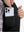 Close-up of boys full-zip fleece-lined puffer vest pocket holding a phone, practical detail in black