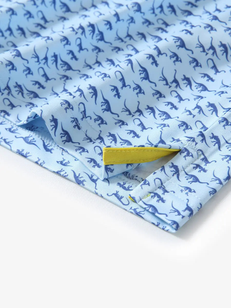 Hem slit detail of BLUE DINOSAUR Performance Quick Dry Print Golf Polo highlighting stitching and finish