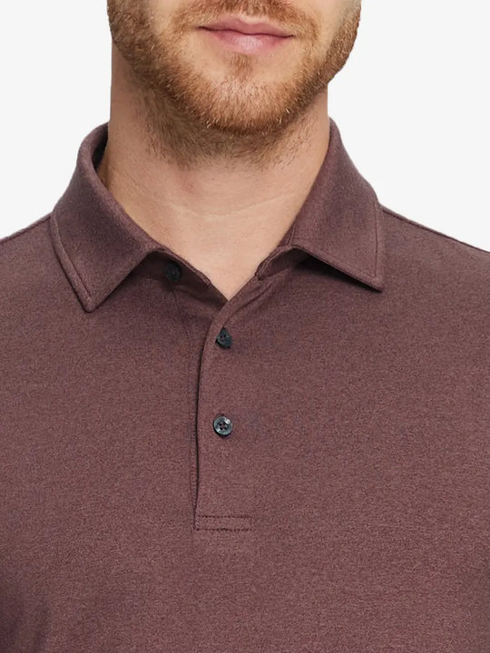 Brick Heather Skin-friendly Long Sleeve Melange Polo – front view from model’s nose to chest