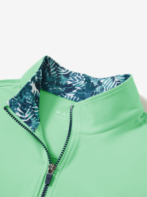 Zipper and inner pattern detail of the print collar quarter zip golf vest in dark grey, highlighting design.