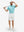 Full-body shot of model holding a golf club in misty blue ultra-light quick dry moisture wicking collared polo shirt