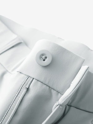 Waist detail of quick dry casual dress pants in glacier grey, featuring button and zipper design.