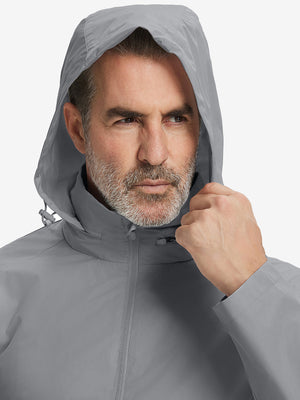Close-up of hood on the lightweight water-repellent softshell hooded jacket, worn by model in neutral grey.