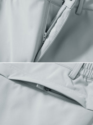 Zipper detail shot of light gray thermal water repellent fleece dress pants