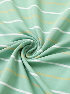 Fabric close-up of trendy boys stripe polo shirts, soft texture and breathable light green stripe feel