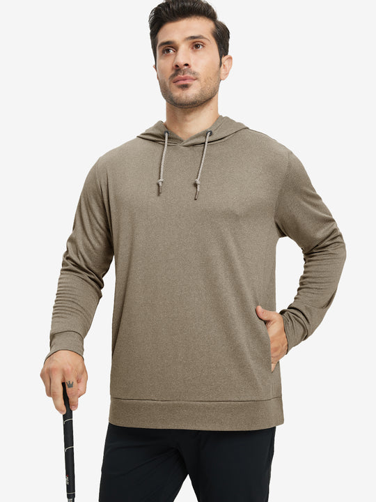 Model with one hand in pocket, wearing classic heather pullover hoodie in brown melange, relaxed look.