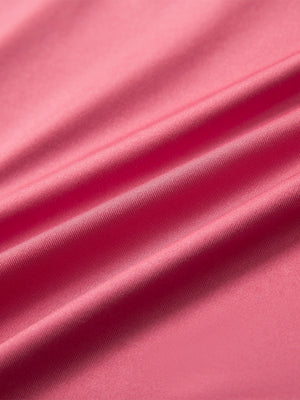 Close-up of cranberry long sleeve solid jersey polo fabric texture showing soft knit and smooth finish details.