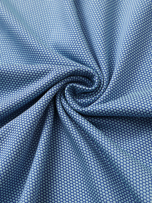 Close-up of aqua performance ananas jacquard polo fabric showing refined texture.