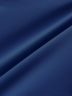Close-up of cobalt water resistant golf shorts fabric texture.