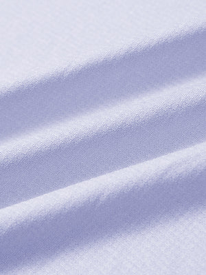 Close-up of light purple melange moisture wicking quarter zip pullover fabric texture