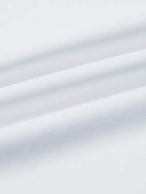 Fabric close-up of print collar quarter zip golf vest, smooth material with subtle texture in white