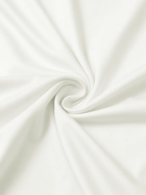 Close-up of fabric on everyday jersey henley shirt, soft knit texture with relaxed cream tone