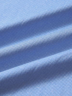 Close-up fabric detail of moisture wicking quarter zip pullover, smooth knit and quick-dry feel in light blue melange