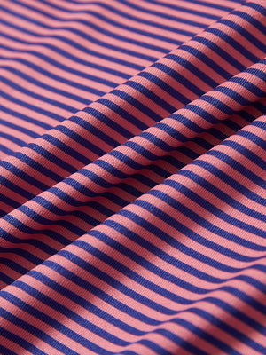 Texture close-up of Kids stripe golf polos with soft fabric and bright pink blue stripe stripes