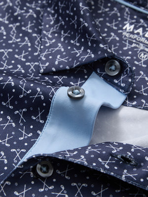 Detail shot of the collar on the dark blue golf club 4 way stretch print collared polo shirt, emphasizing the classic neckline design