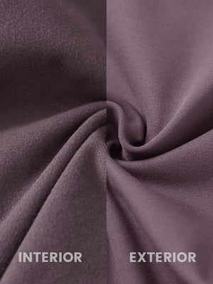 Close-up of the inner and outer fabric of women's stretch fleece lined water resistant joggers in light pinkish purple, showing fleece lining and exterior.