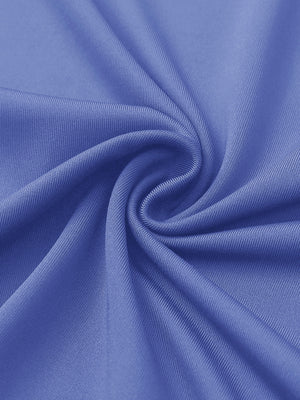 Close-up of haze blue women's performance solid polo fabric texture.