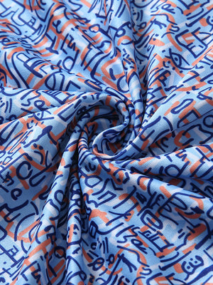 Close-up fabric detail of performance quick dry print golf polos, breathable texture with bluejau doodles pattern