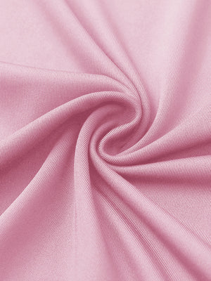 Close-up of pink women's performance solid polo fabric texture.