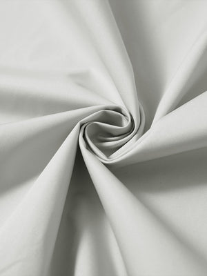 Detail of the lightweight water-repellent softshell hooded jacket in glacier grey, fabric twisted into a spiral roll.