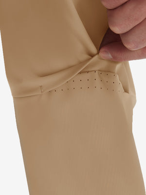 Detail view of design on light khaki  flat front golf joggers pants with belt loops
