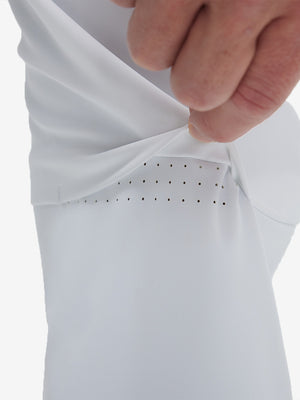 Detail view of design on white flat front golf joggers pants with belt loops