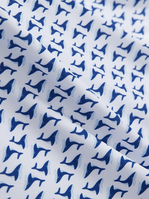 Close-up of white navy flower  performance quick dry print golf polos fabric texture