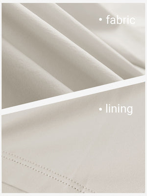 Close-up texture of oyster gray women's moisture-wicking athletic tennis skirts fabric showing detailed outer and inner lining material.