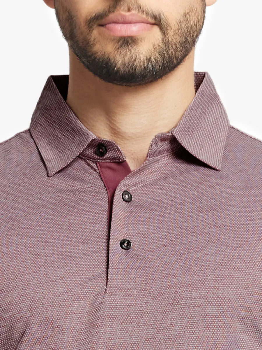 Model front close-up from nose to chest wearing Ventilated Heather Jacquard Polo in DUSTY ROSE HEATHER