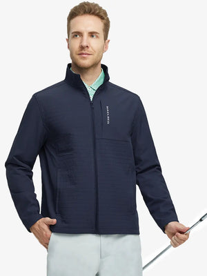 Front-facing half-body shot of model holding a golf club in the Navy Softshell Jacket – ready for the course