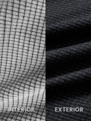 Close-up of melange fabric on warm fleece golf hoodies pullover, showing texture and detail in black melange.