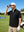 Front upper body angled shot of model wearing black lightweight UPF50+ short sleeve golf vest jacket and using a golf rangefinder on the golf course