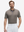 Front half-body view of a model wearing the light brown everyday classic solid polo, displaying the chest pocket detail