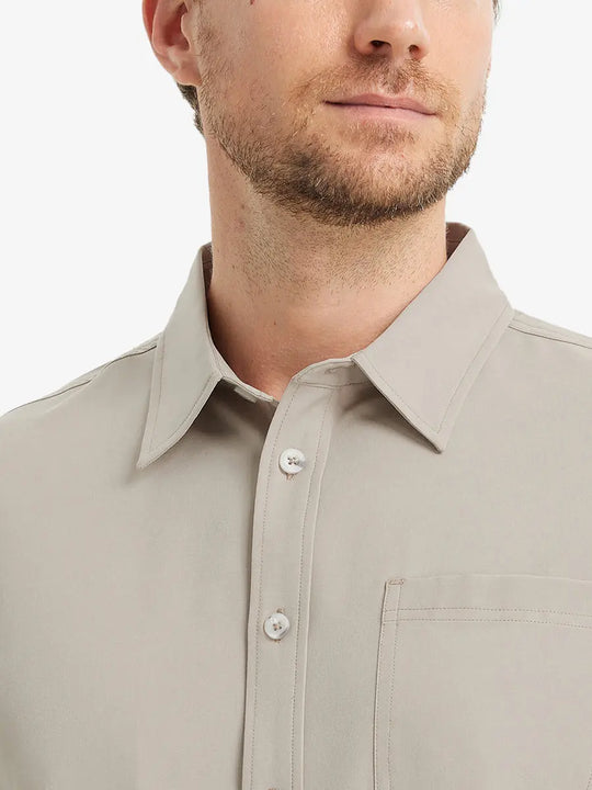 Front view from nose to chest showcasing the crisp DARK KHAKI polo.