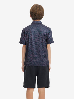 Back half-body view of youth wearing navy pink seagull performance print boys golf polo, showing rear design.